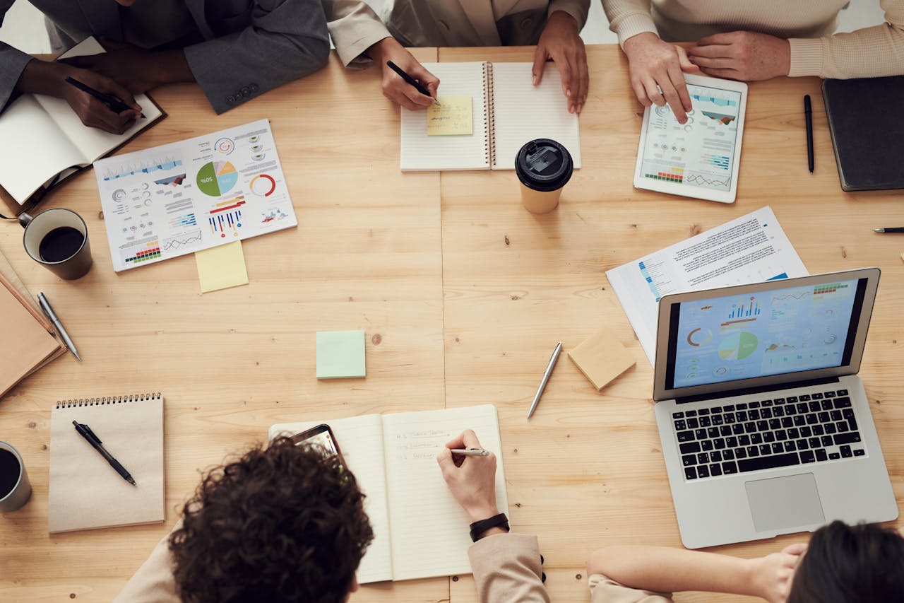 Business meeting with team around conference table
